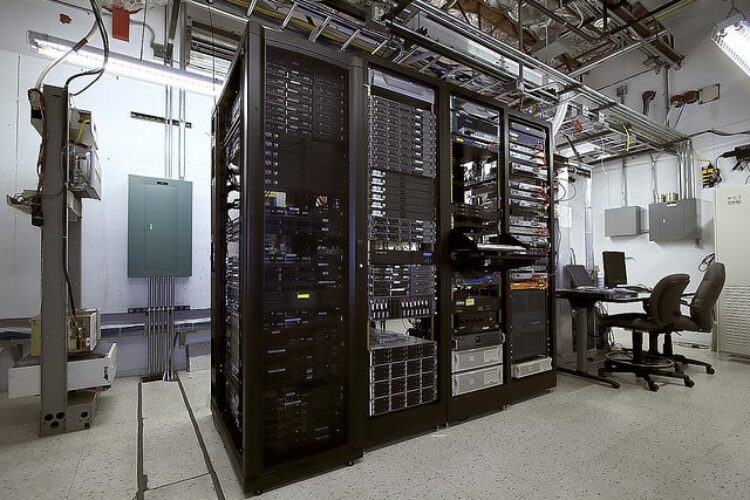 A clean and organized server room representing data center setup services.